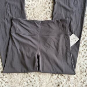 Athleta Barre flared Midrise pants never worn with tag